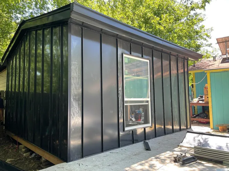 Black standing seam metal wall panels for Metal Roof Installation in Mayfair